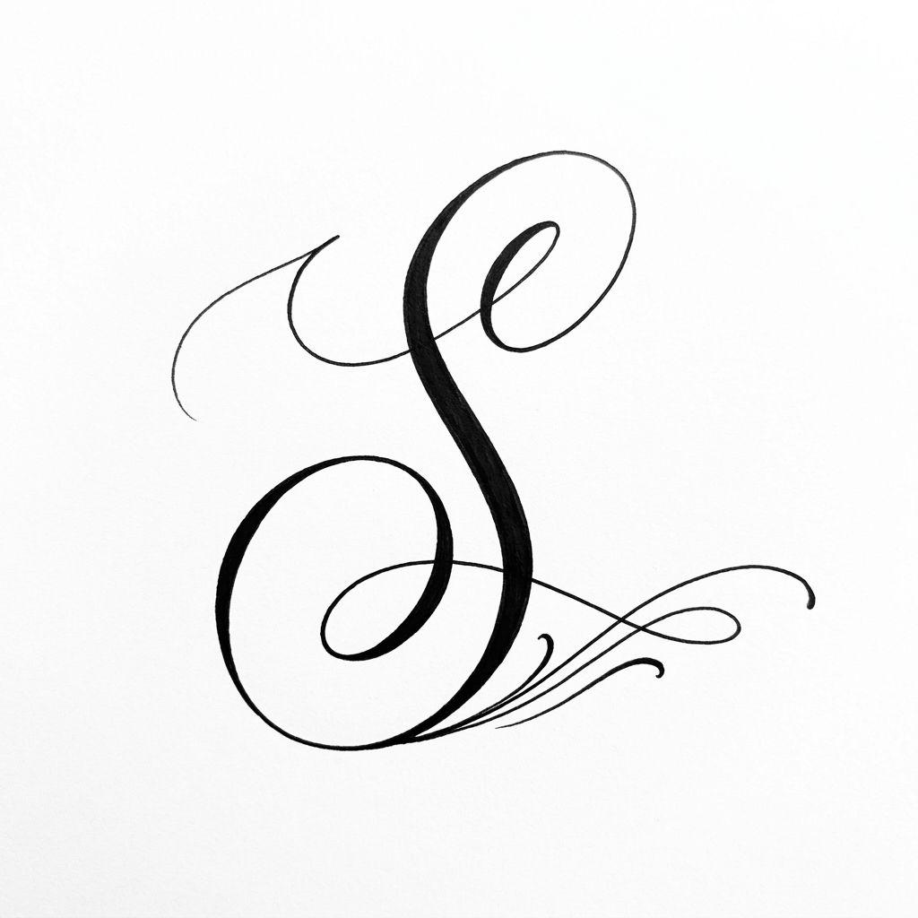 ankle-tattoo lettering initial