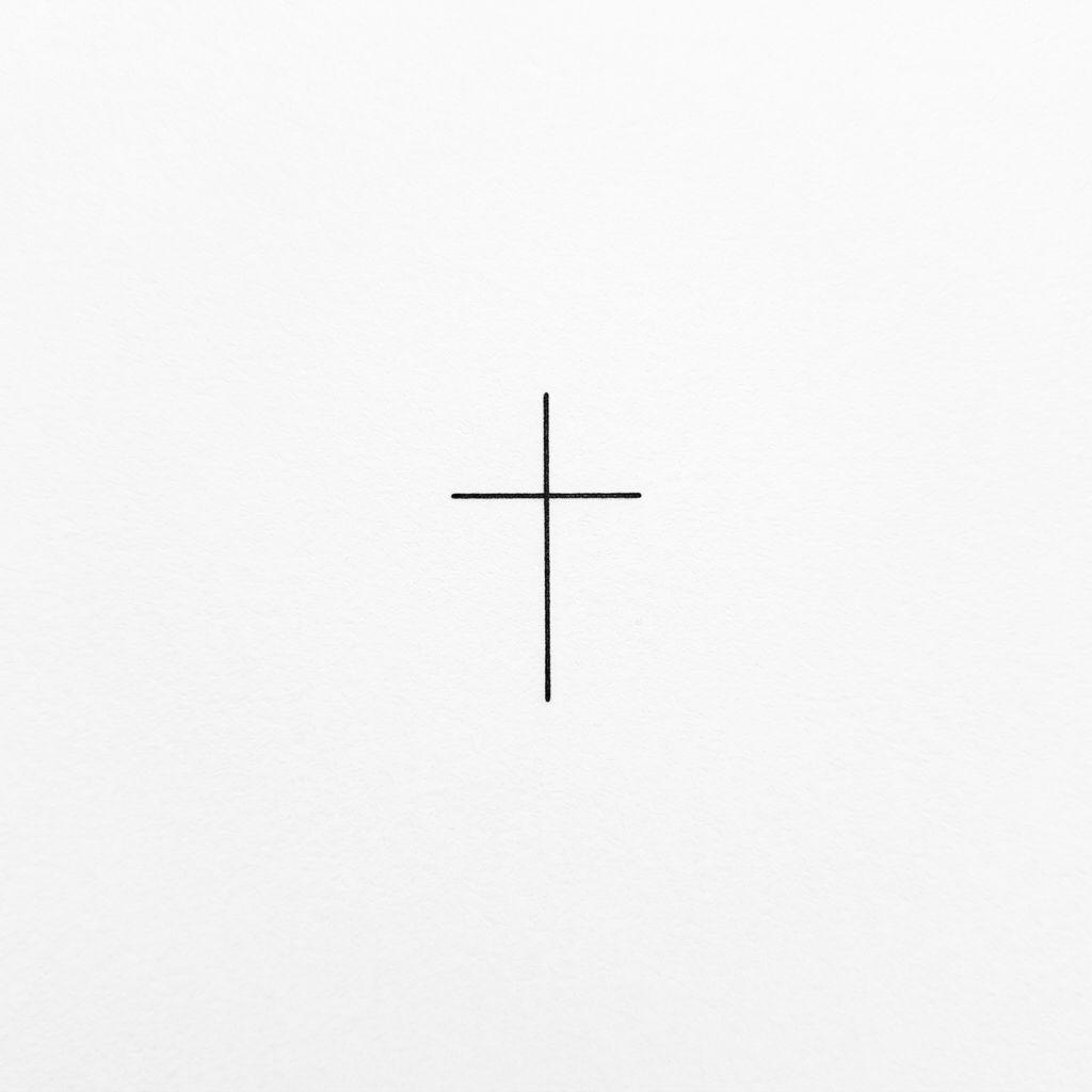 finger-tattoo spiritual cross