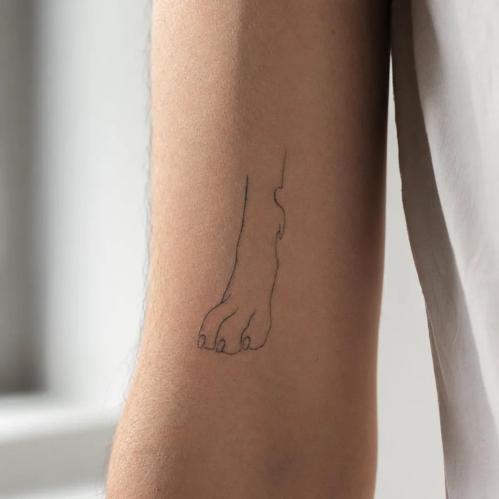 dog-tattoo minimalist paw print
