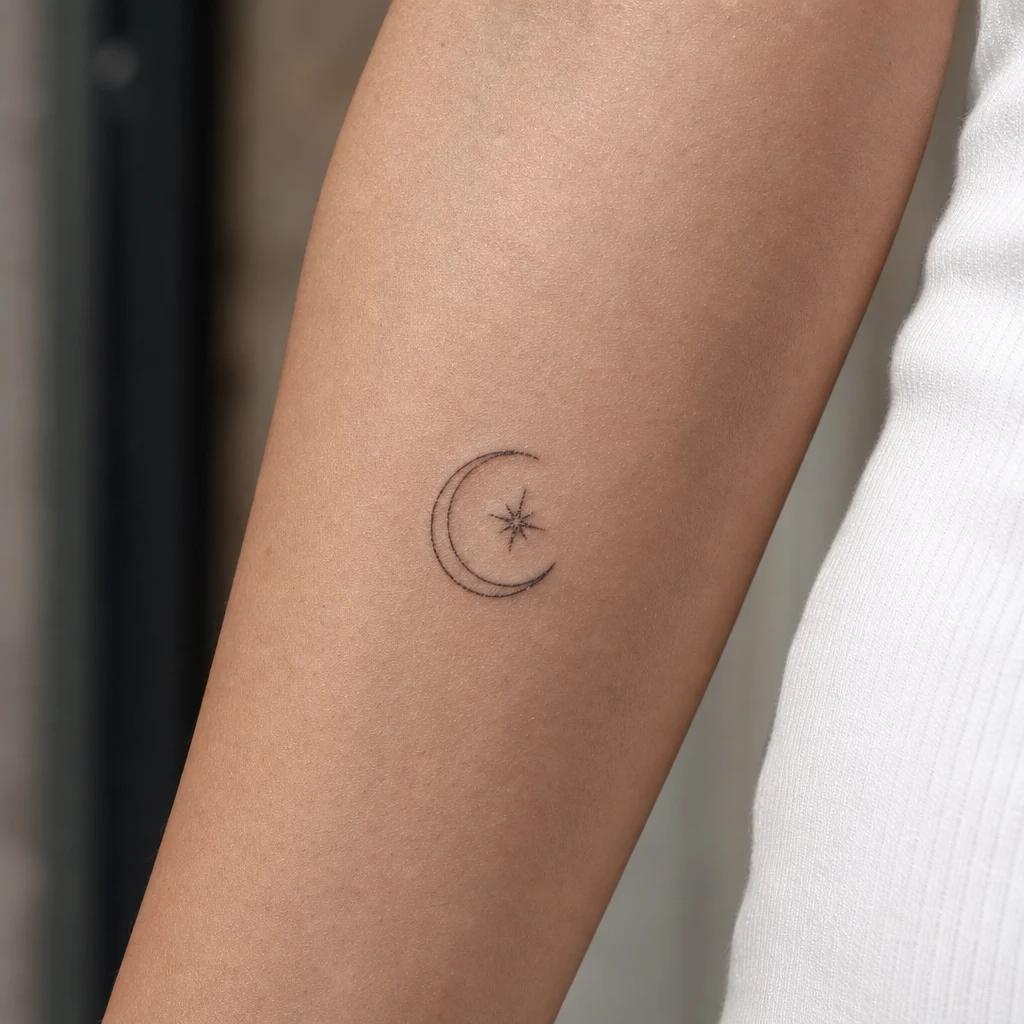 star tattoo star and crescent moon, realistic photo on skin