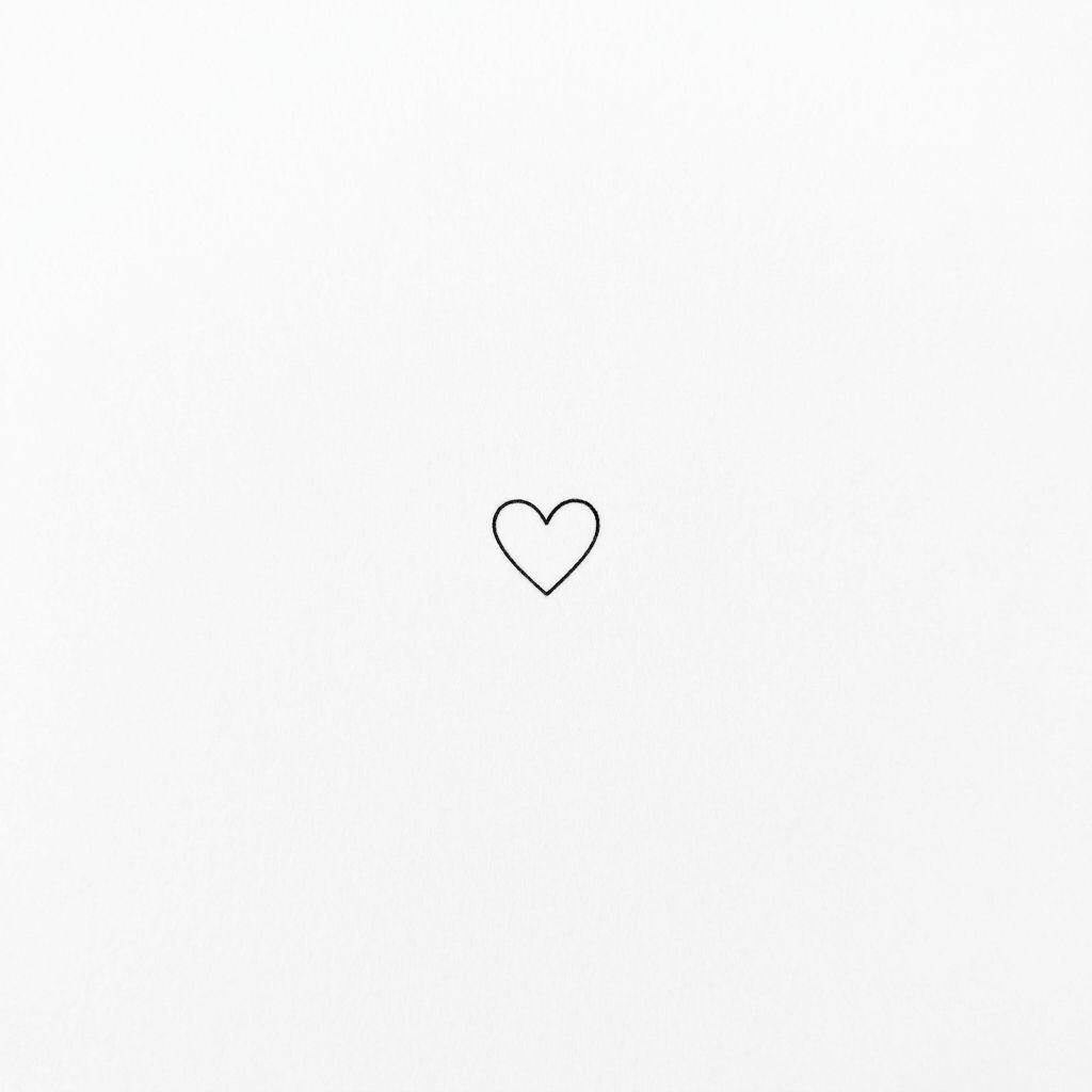women's finger tattoo tiny heart, design on white background