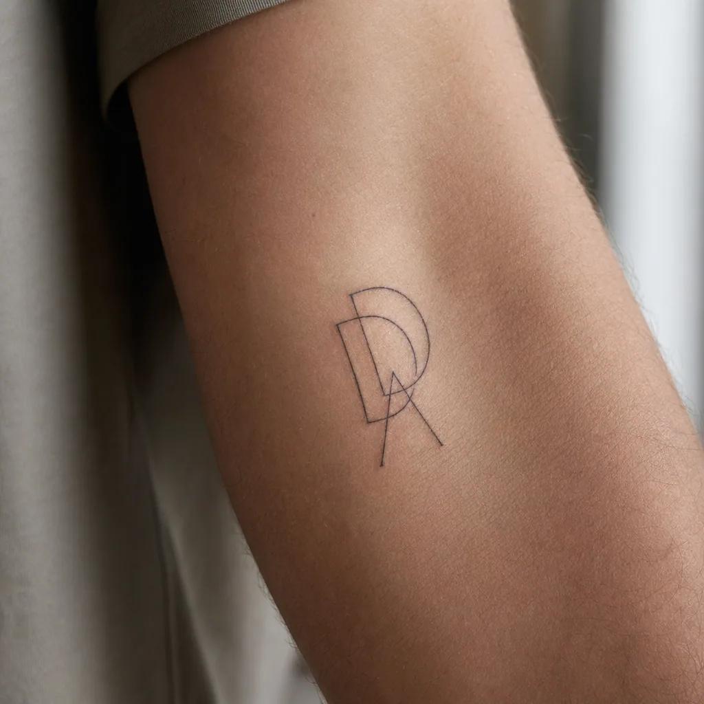 family initials tattoo minimalist initials, realistic photo on skin