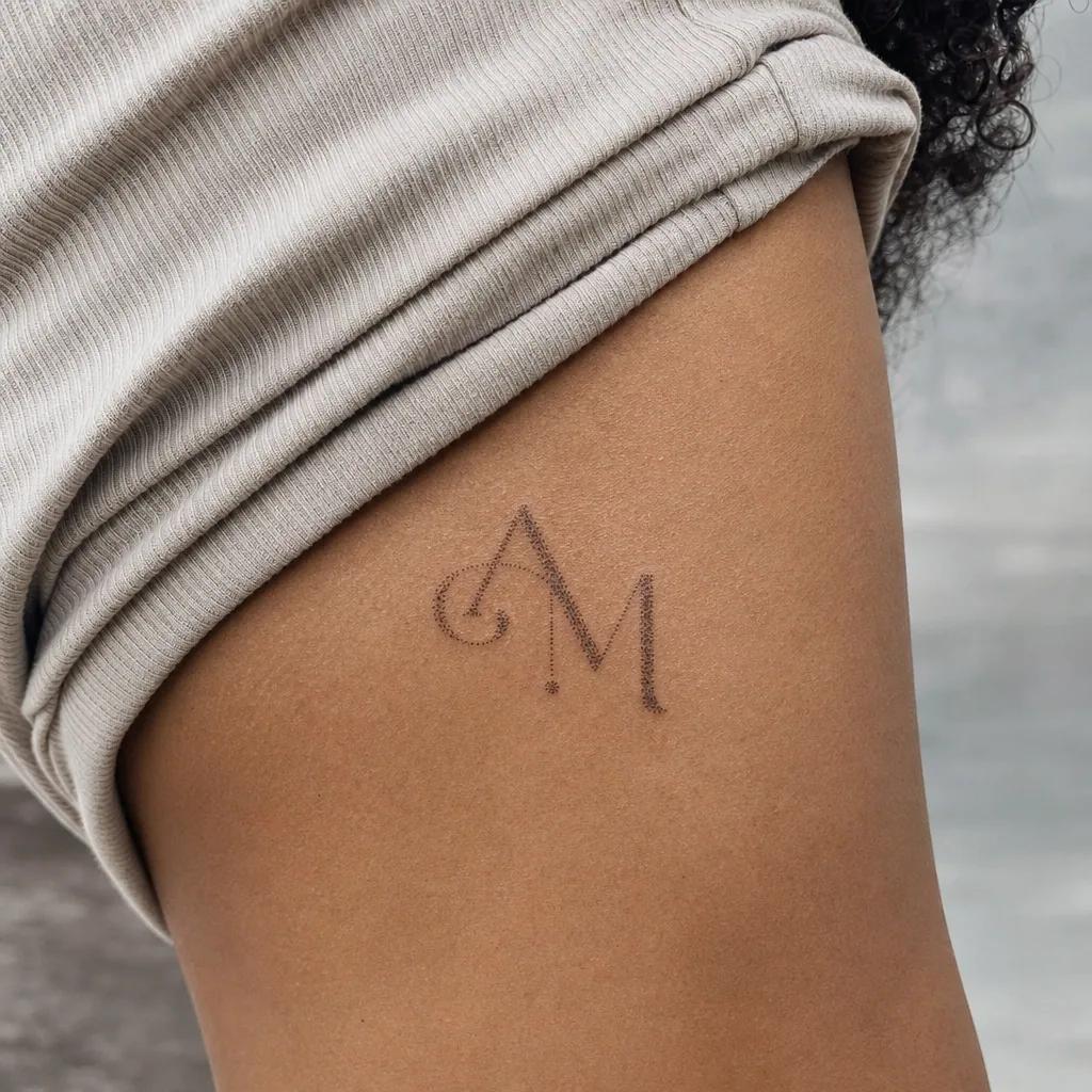 family initials tattoo latin initials, realistic photo on skin